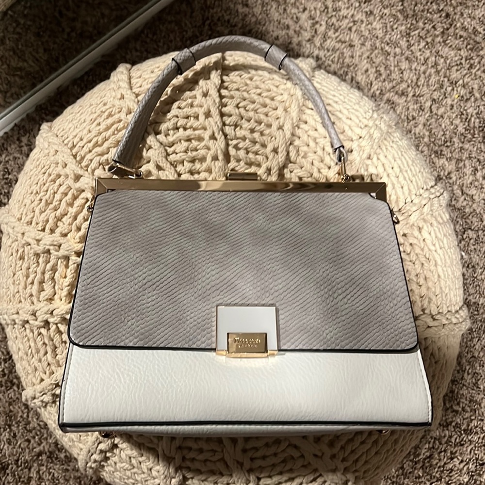Trying to clear my closet, this is a gray/white with gold detailed purse